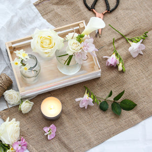 Hessian mat with flowers and candles  