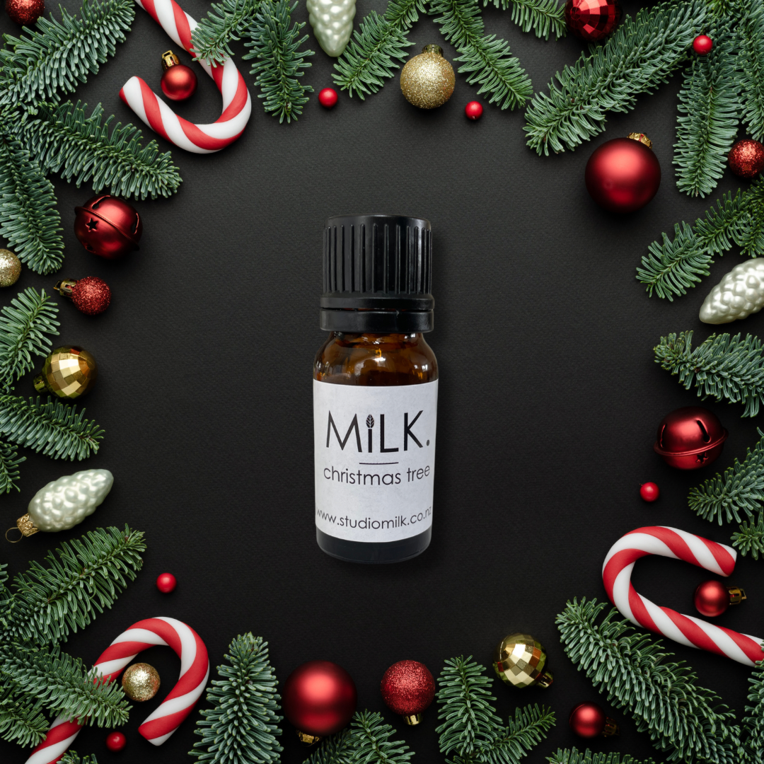 Christmas pine needles and candy canes with fragrance oil