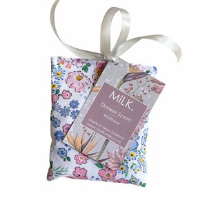 Floral drawer scent packet with a ribbon on a white background