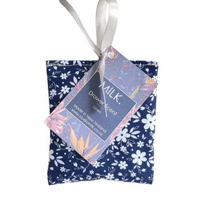 Floral-patterned product with a visible brand tag on a white background