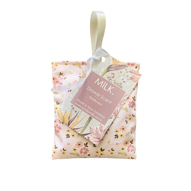 Floral-patterned drawer scent with 'MILK.' label on a white background