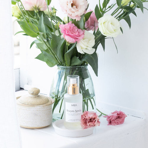 Room Spray on shelf in bathroom